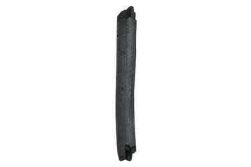 Single piece of natural black charcoal, elongated and textured, stands vertically against a clean white background, captured with soft studio lighting © Chinases