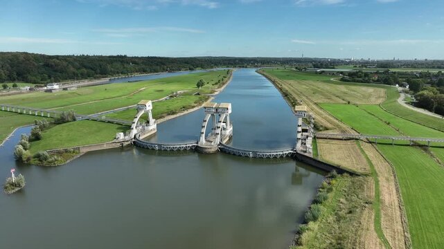 Aerial view of the Driel Weir (Stuw bij Driel). It is a major water management structure located in the Nederrijn river near Driel, Gelderland. Often referred to as the "tap of the Netherlands" (de kr