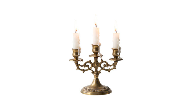Vintage brass candelabra with three burning white candles, antique golden candlestick holder, ornate metal candle stand isolated on white background