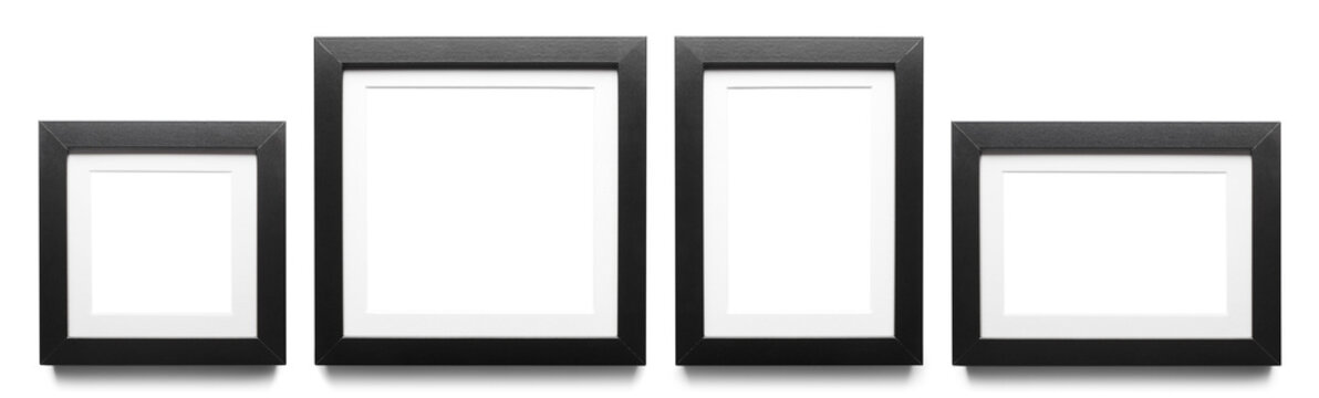 Set of four black photo frames in different sizes and orientations, isolated on transparent cutout background