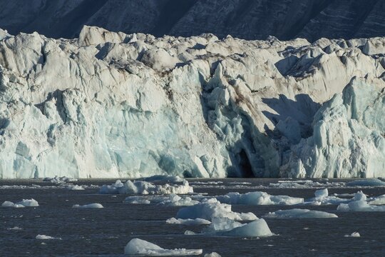 Small icebergs float in the fjord, glacier front, crown or crown glacier glaciers, Kongsfjord or Kongsfjorden, Spitsbergen archipelago, Svalbard, Norway
