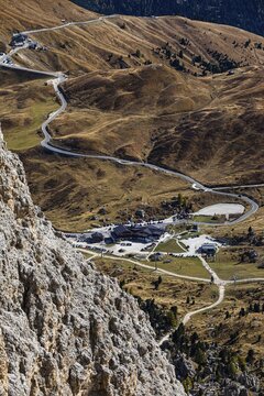 Gondola from the Sella Pass to the Sassolungo Pass, behind the Sella Pass and the Sella Pass road, Dolomites, South Tyrol, Italy