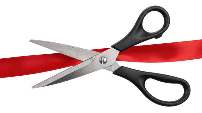 Scissors Cutting a Red Ribbon for a Grand Opening Ceremony