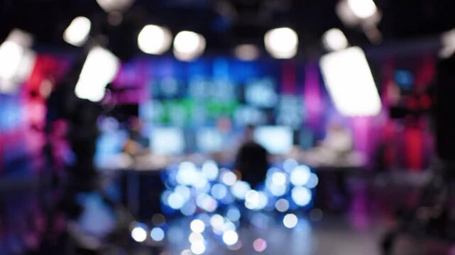 Abstract blurred view of the studio at TV station b showing lighting and equipment setup