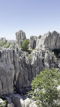 Towering Limestone Cliffs in Gidengelmez Mountain Landscape