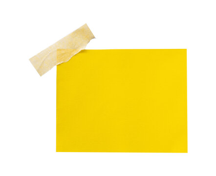 yellow sticky note with torn paper tape on white background isolated