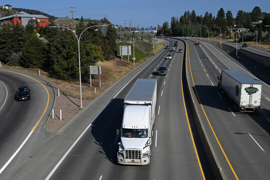 Kamloops, BC, Canada - July 20, 2026: A cars are driving along the highway near the city of Kamloops in British Columbia.
Road in Canada.