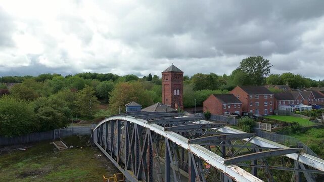 ship canal aerial view over Runcorn old quay swing bridge towards waterfront property