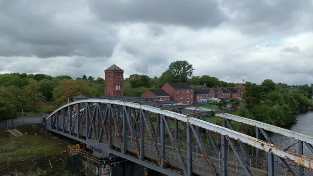 Aerial view establishing Runcorn old quay iron swing bridge on the ship canal
