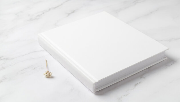 Blank White Hardcover Book on White Marble Surface Mockup