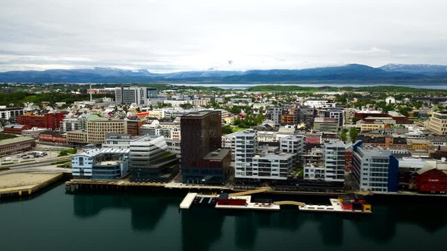 Aerial View Of Harbor And Waterfront Buildings In Bodo Coastal City In Nordland, Norway. - hyperlapse shot