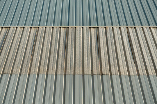 Corrugated metal sheet wall texture with vertical parallel lines pattern