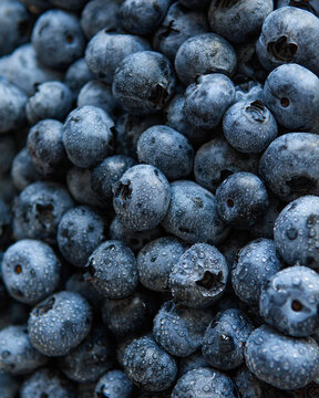 Full Frame Close-Up of Ripe Wet Blueberries