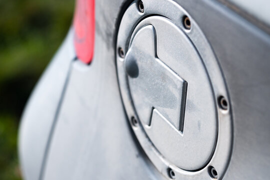 Close up of silver car fuel cap