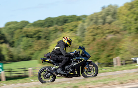 Milton Keynes; UK - Sept. 20th 2026: Man riding a 2026 Honda cbr 650 motorcycle driving on a British road