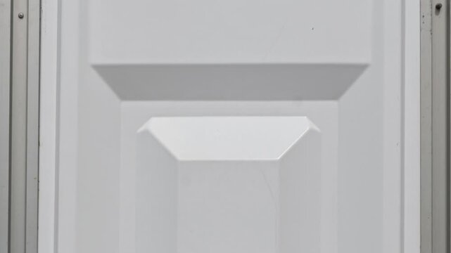 White textured metal panel detail