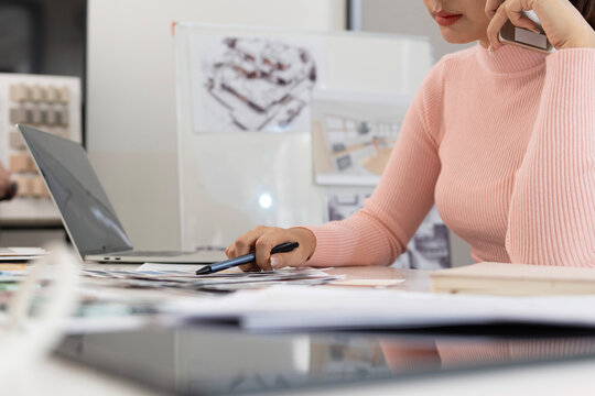 Creative web designer planning UI application and developing digital template