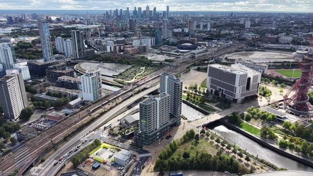 Stratford , Central line tube train heading for London City UK ,drone aerial view