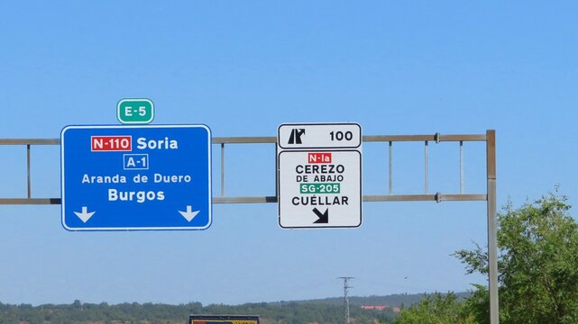 A road information sign on the A-1 motorway in Spain, indicating directions to Soria and Burgos and Exit 100 to Cerezo de Abajo and Cu&eacute;llar.September 12, 2026