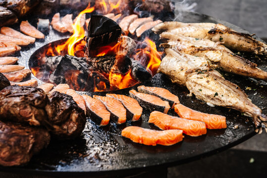 Whole Fish and Meat Grilling on Open Fire