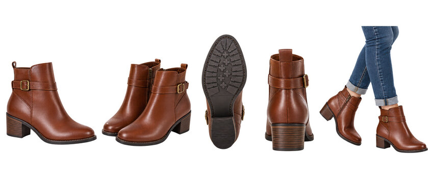 Set of brown leather ankle boots with buckle on transparent