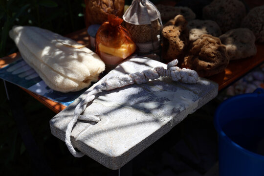 Weight used in the past to rapidly sink sea sponge divers, Symi Island, Greece.