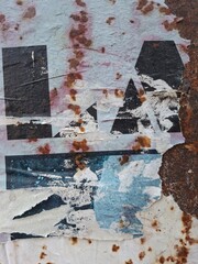 Torn and ripped street poster background, messy old paper collage art © DaliCeMedia