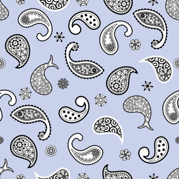 A subtle vintage paisley seamless pattern featuring black and white floral motifs with fine details on a soft light blue background for fabric designs.
