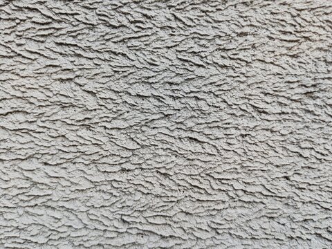 Texture of white lightweight concrete blocks, raw material for walls.