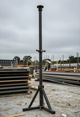 Obraz premium Construction support and structural stability, adjustable steel prop for building reinforcement and heavy load bearing on a development site