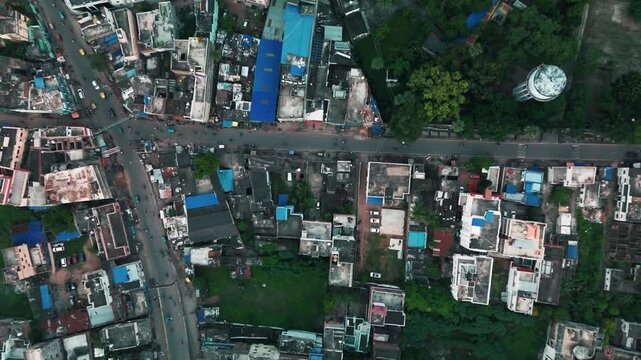 4k Top Down Aerial View of Busy City Traffic Intersection and Flyover Bridge in India.