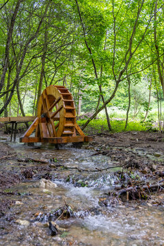 National park Muranska Planina, stream with a water mill wheel, Slovakia