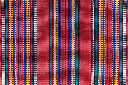 Mayan textile fabric close up on art and craft market, Antigua, Guatemala.