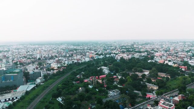 Modern Architecture in India: 4K Aerial View of the Building and City Skyline at Haze. Top down Buildings and Apartment with Multiple Building aerial.	