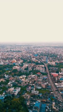 Modern Architecture in India: 4K Aerial View of the Building and City Skyline at Haze. Top down Buildings and Apartment with Multiple Building aerial.	