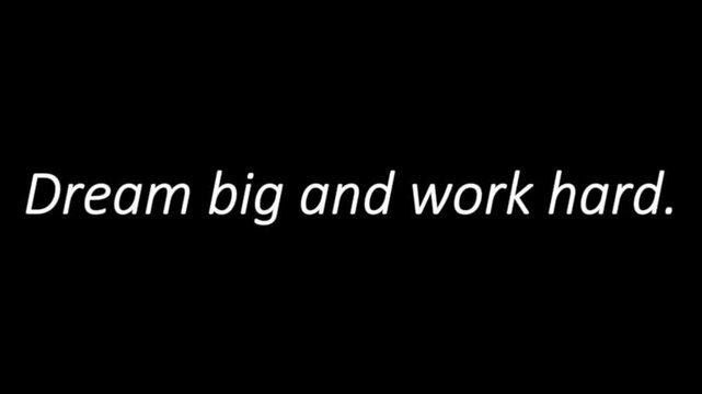 Inspirational text stating dream big and work hard rendered in clean white letters against a dark background serves as a motivational reminder for personal growth and achievement.
