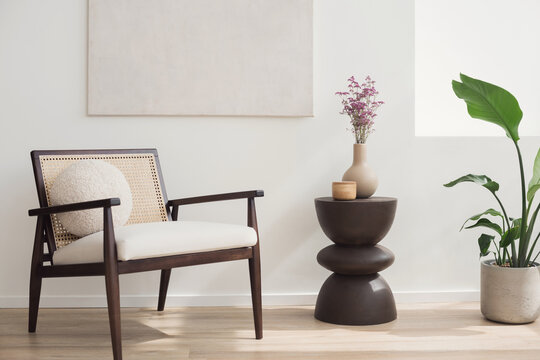 Modern interior with chair and trendy furniture, Home staging and minimalism concept. Minimal Scandi design interior