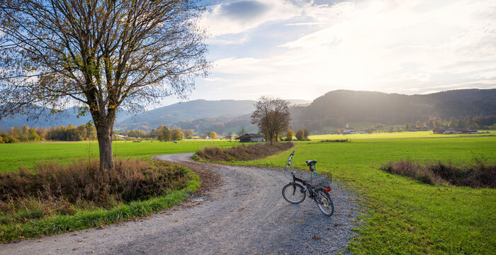 bike route through green pastures near Bad Feilnbach. with folding bike