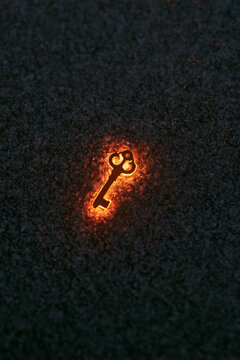Minimalist glowing key on dark floor with macro photography neon cyberpunk style DSLR f 1