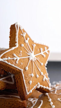 Gingerbread star cookie with white icing decoration creating festive holiday dessert