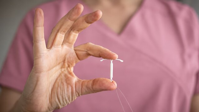 Healthcare Professional Holding Hormonal IUD for Long Acting Reversible Contraception