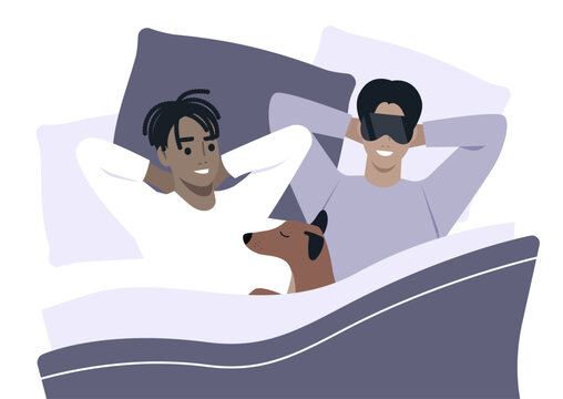 A family of two shares a joyful morning in bed, surrounded by soft pillows and blankets, bonding with their dog who is peacefully nestled among them, capturing moments of love and warmth.