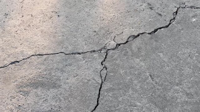 Deep Fractured Concrete Surface Background of Damaged Infrastructure