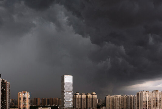 City view covered in dark clouds