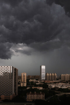 City view covered in dark clouds