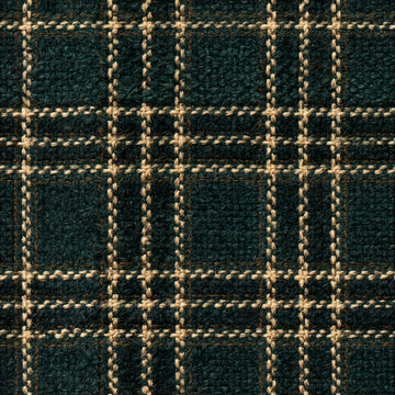 Seamless pattern dark green tweed fabric showing beige criss cross lines forming a classic plaid pattern, representing textile texture
