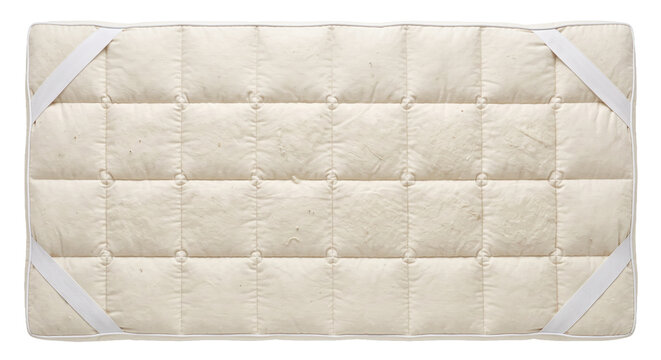 Rectangular quilted natural mattress pad with elastic straps at each corner, viewed from directly above on a white background