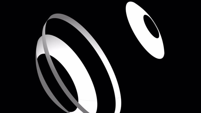 Abstract 3D motion graphic animation with rotating white rings on black background.