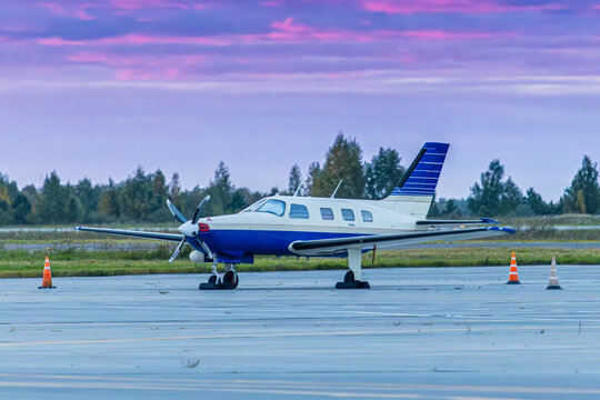 Private turboprop aircraft at the airport in the morning light