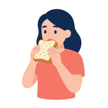 A young woman with dark hair wears a coral t-shirt and eats a sandwich with green filling